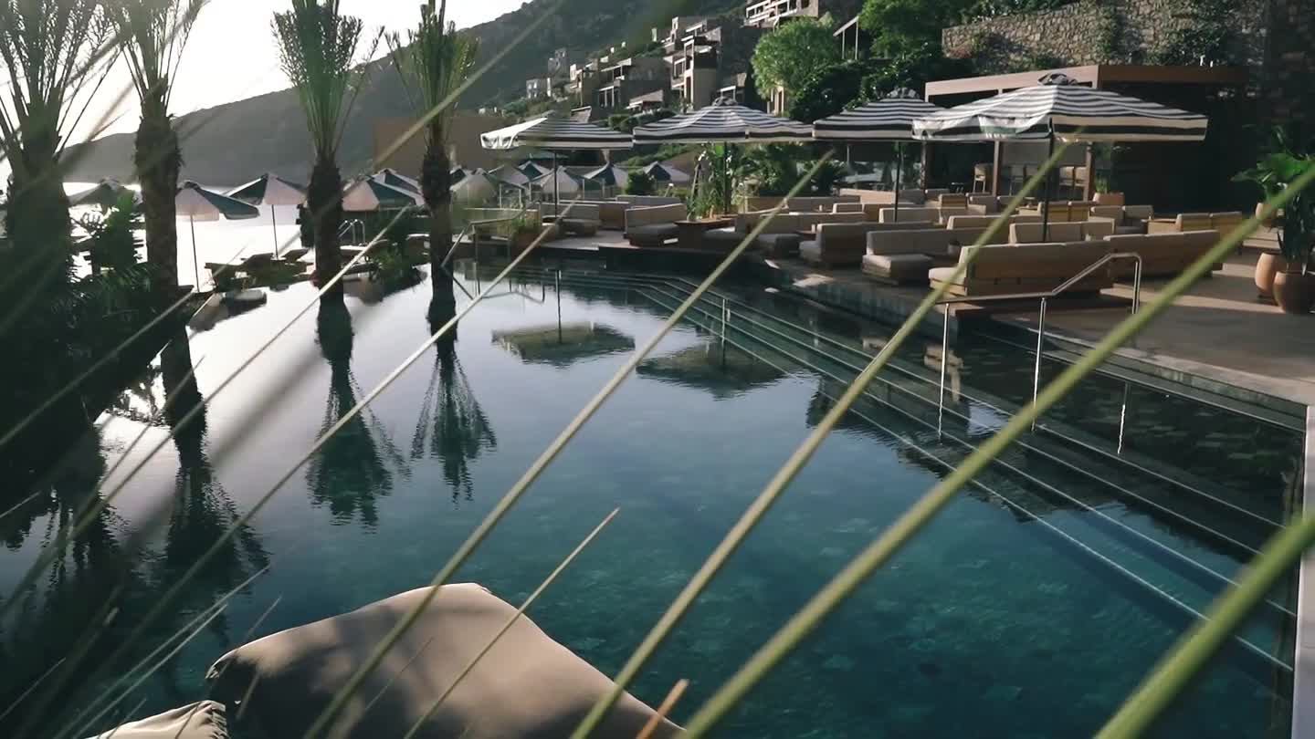 An ocean-facing pool and a considered hotel terrace